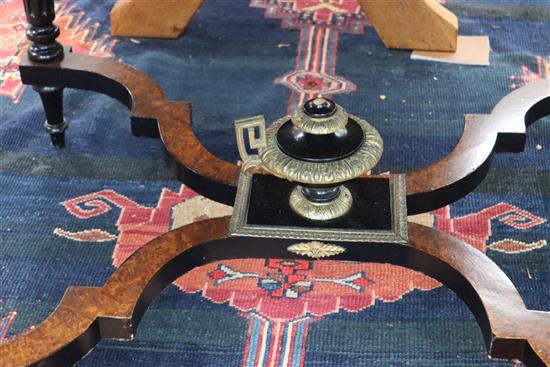 A Louis XVI style marquetry inlaid centre table, with shaped X stretcher W.127cm